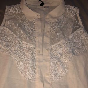 H&M’s cute dressy blouse with lace and mesh